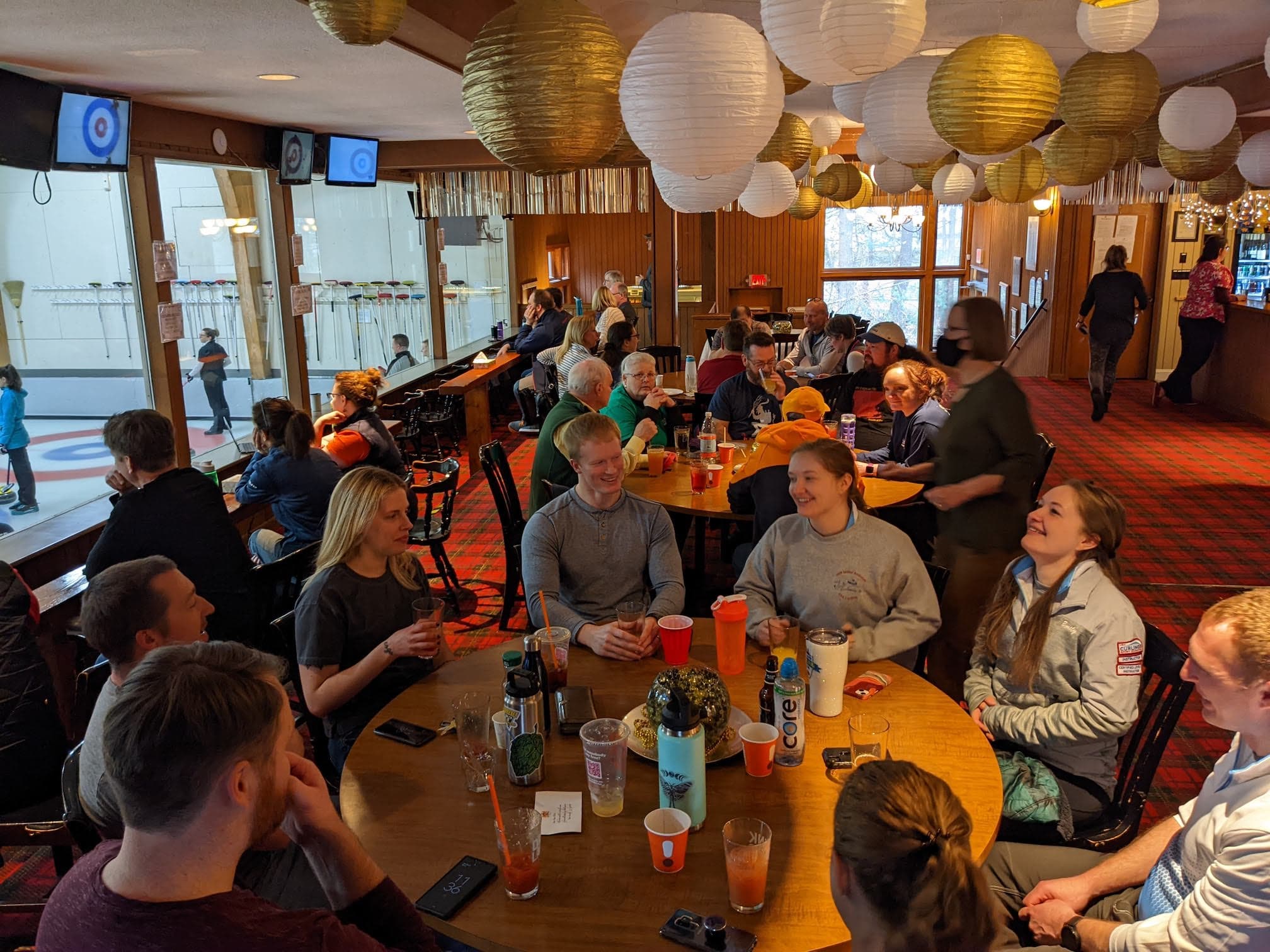 Curlers enjoying a rental experience at Broomstones